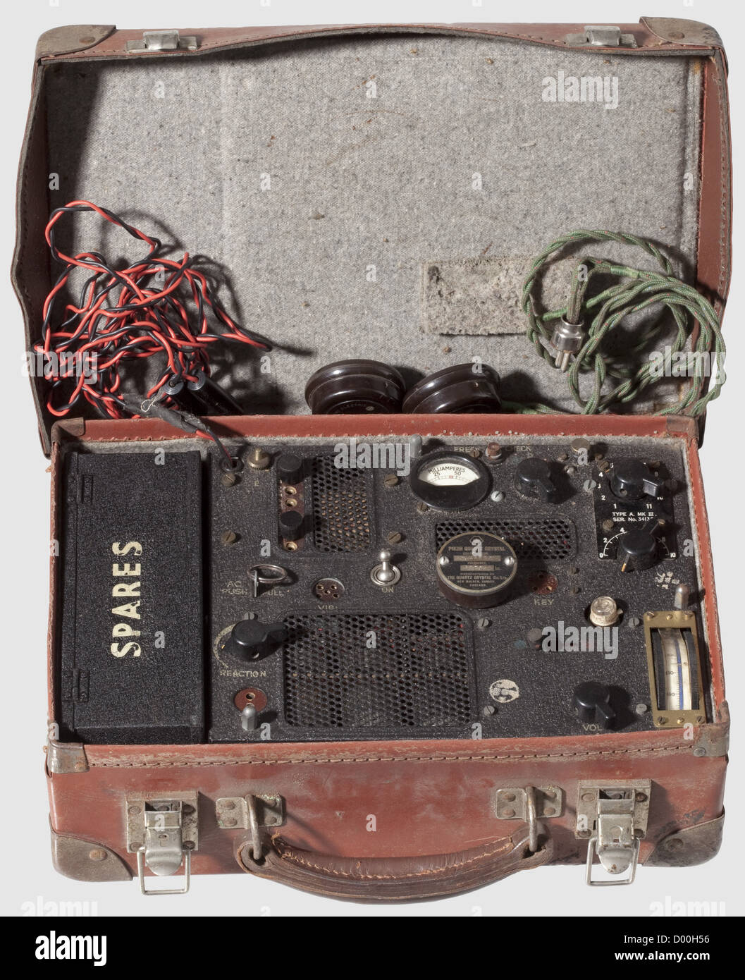 A spy radio 'Type A MK. III,',SER. No. 34136 of the British Special Operation Executive(SOE)from the Second World War. Consisting of a sender-receiver,a 'Spares box'(with one light bulb,two 'Crystal unit(s)','W&W vibrator 6 Volt type NS/6',two adapters),morse key 'S.230/i.R.',headphones 'Multitone electric Co. Ltd. London'(incomplete)and a 'Piezo quartz crystal'. With civilian suitcase and original handbook 'Portable transceiver model A MK. III'. Completeness and functionality not tested. Size ca. 31 x 20 cm,height 10 cm,historic,historical,1930,Additional-Rights-Clearences-Not Available Stock Photo