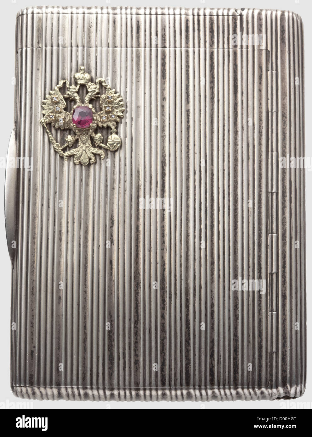 A cigarette case with golden double-headed eagle,Russia circa 1910.Silver,gold-plated interior.The lid bearing a Russian double-headed eagle applied in gold with a bezel set red garnet and eight small rose-cut diamonds.The interior with illegible master marks 'J??' and hallmarks for '84' zolotniki.10.5 x 7.7 x 1.7 cm,weight 226 g.Including a name card of Count Otto Czernin.The cigarette case formerly belonged to the Austrian diplomat Count Otto Rudolf Czernin(1875 - 1962).Before the First World War he was counsellor of embassy in Saint Petersburg and,Additional-Rights-Clearences-Not Available Stock Photo