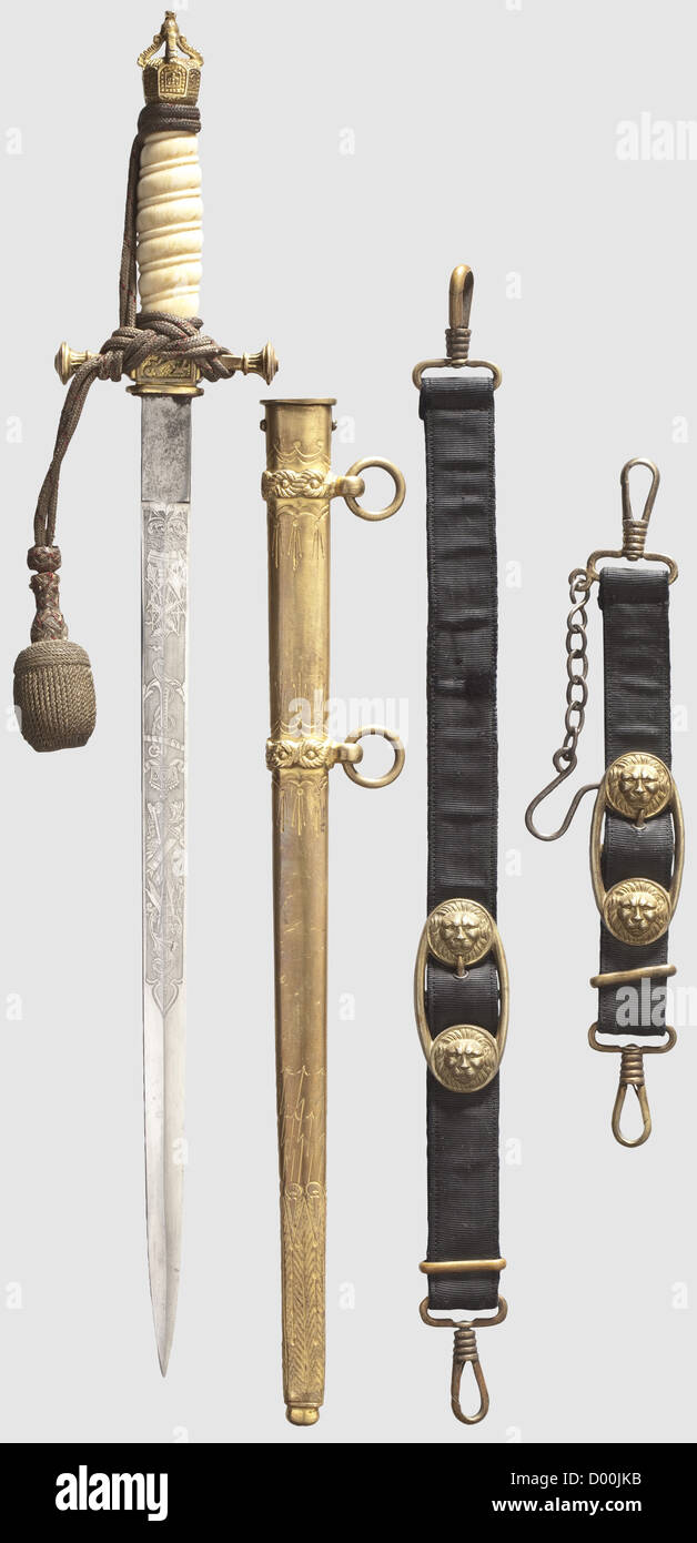A 1890/1901 model for officers of the Imperial Navy,with ivory grip and engraved name 'Frhr.v.Bimbach' No maker's mark.Nickeled,double-etched blade with fouled anchor beneath an Imperial crown,sailing ships and trophies.Remnants of gilding on the openwork crown-headed pommel.The crossguard fitted with a push button scabbard release.Helically carved ivory grip(age cracks).Imperial portepee(signs of usage).'Lightning bolt' scabbard retaining some gilding,the hanger of ribbed silk with velvet liner and gilt fittings,engraved name 'Frhr.v.Bimbach' be,Additional-Rights-Clearences-Not Available Stock Photo