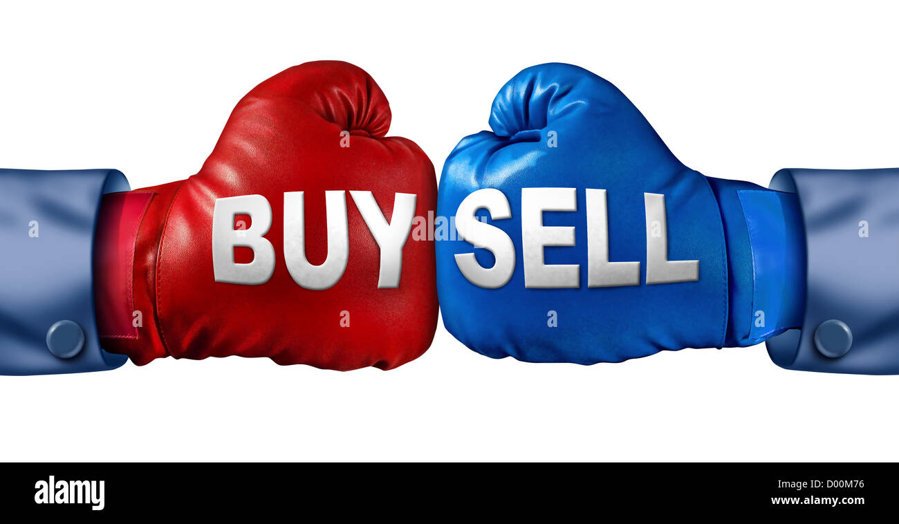 Buy or sell stocks or shares in a business as a boxing match in the symbolic financial ring of investing with two gloves fighting for trading direction in the stock market isolated on a white background. Stock Photo