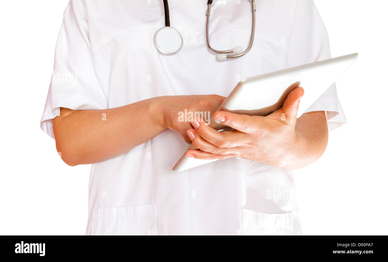 Female doctor with stethoscope using digital Tablet PC close up. Stock Photo