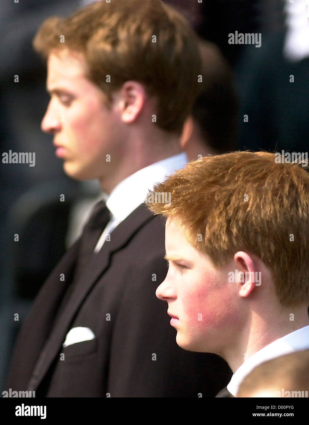 Prince William and Prince Harry during Queen Mother's funeral procession, Queen Mother's coffin during her funeral, public funeral of The Queen Mother Stock Photo