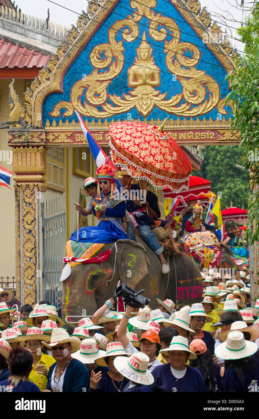 Elephant procession through the gates of Wat Hat Siao, Elephant Ordination Ceremony, Sukhothai, Thailand Stock Photo