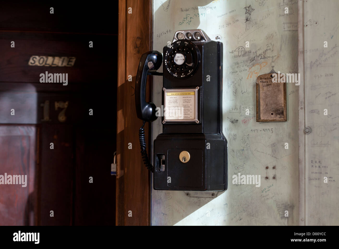 Antique pay phone on wall Stock Photo Alamy