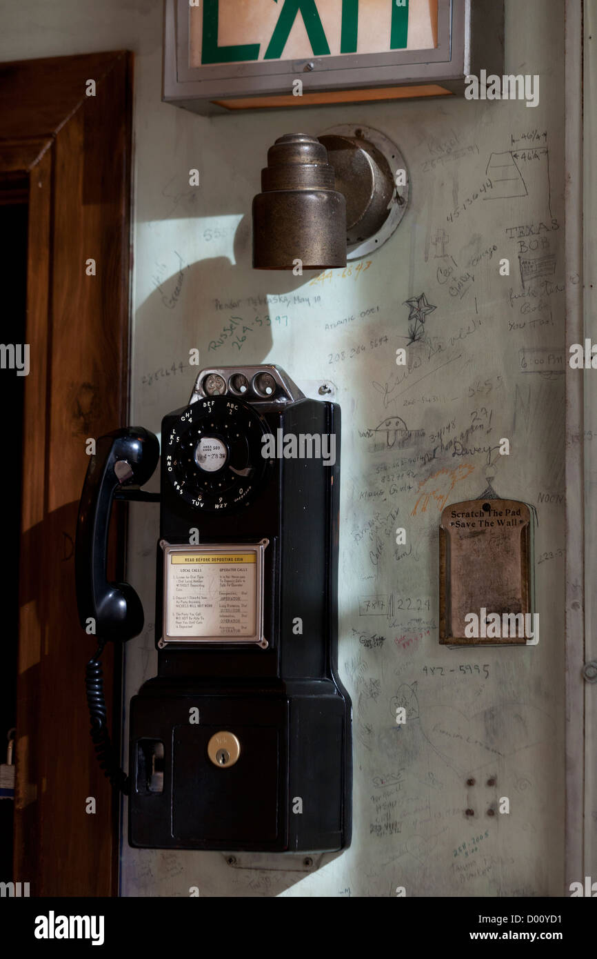 Antique pay phone on wall Stock Photo Alamy