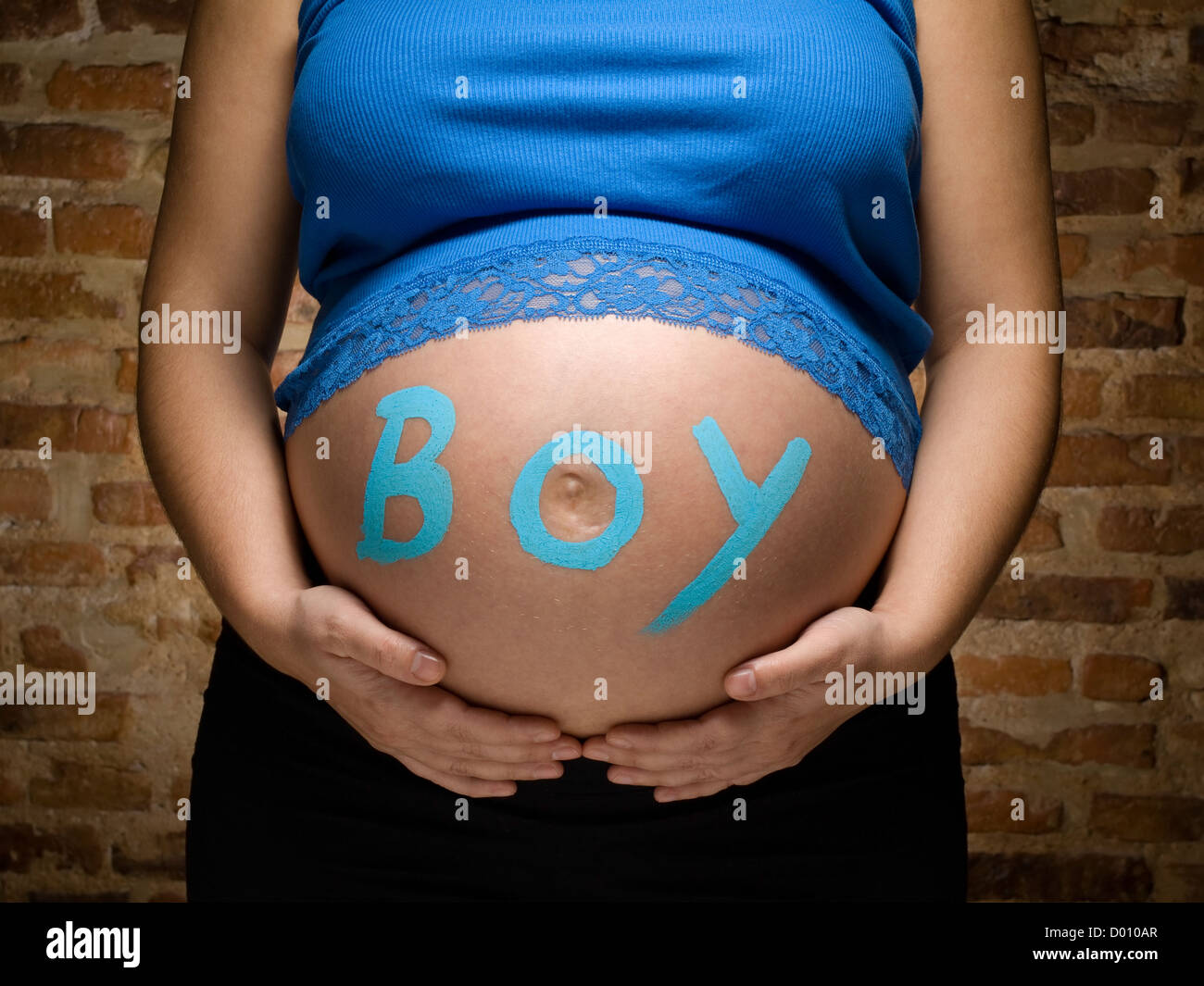 pregnant woman belly with baby boy