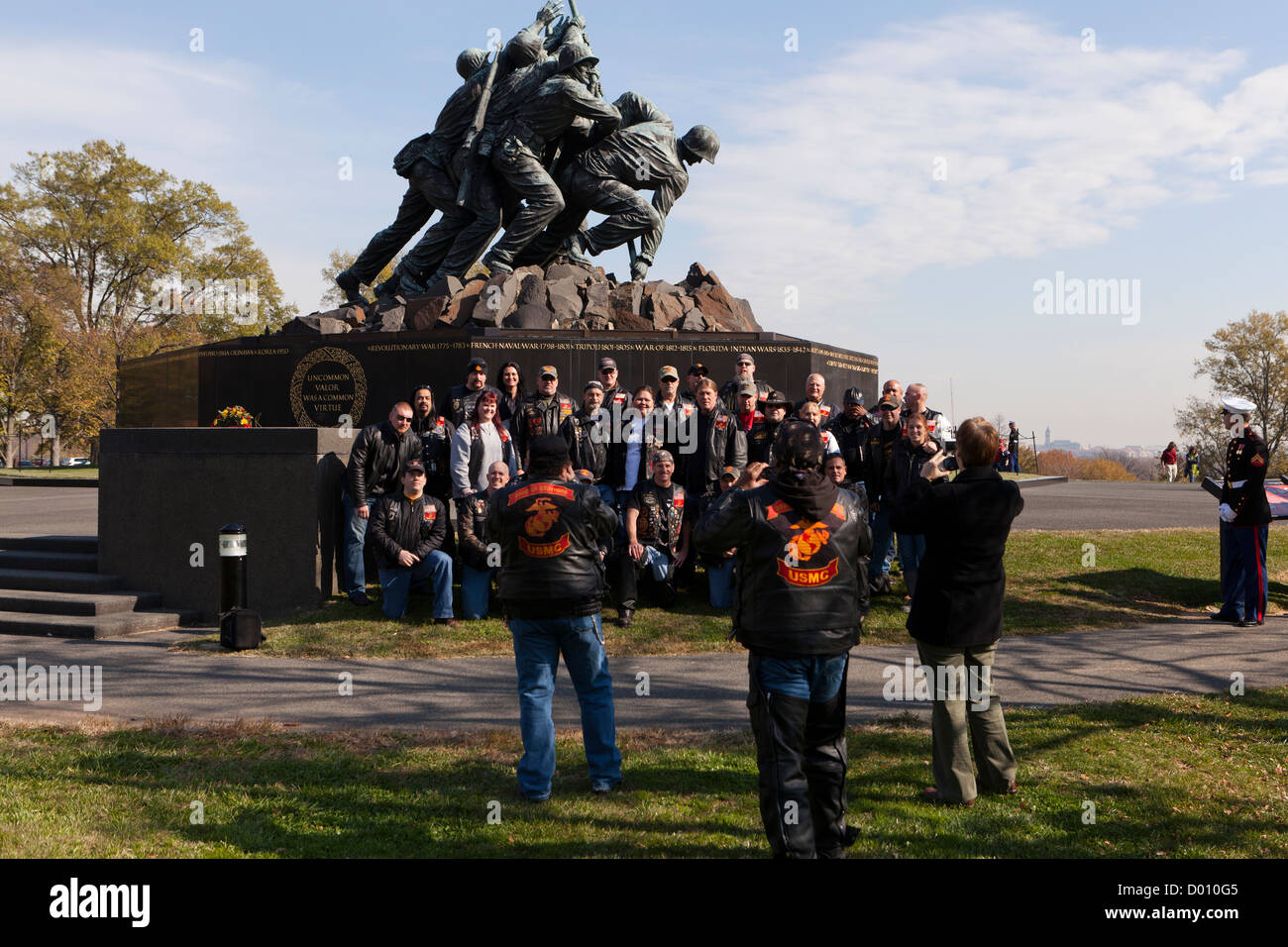 Band of Brothers USMC motorcycle riding club members pose for a picture in front of the Marine Corps Memorial Stock Photo