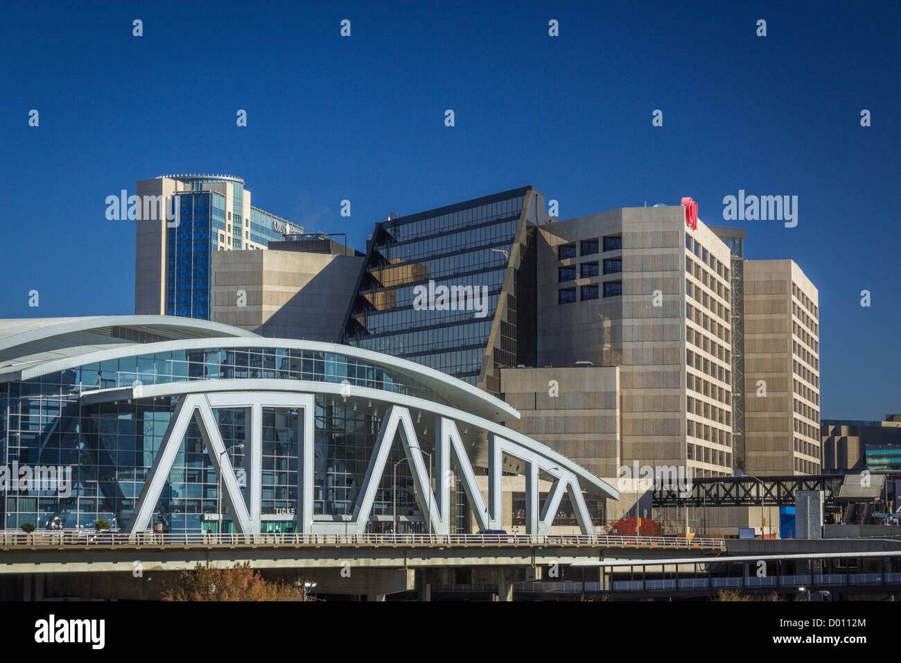 Philips Arena and CNN Center  Philips Arena is a multipurpose indoor arena located in Atlanta, Georgia. Stock Photo