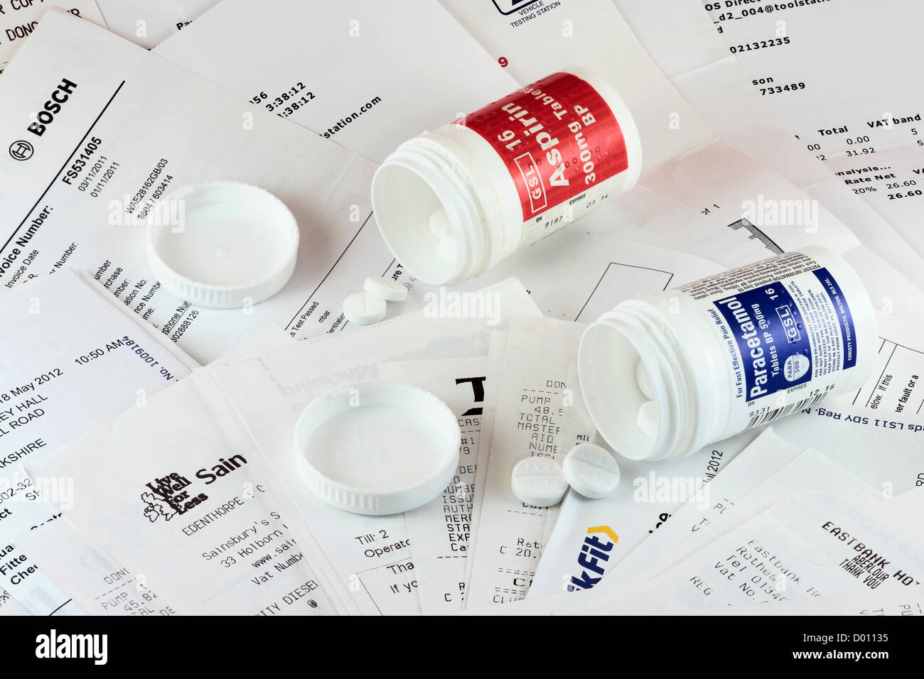 Receipts, Invoices and Painkillers Stock Photo