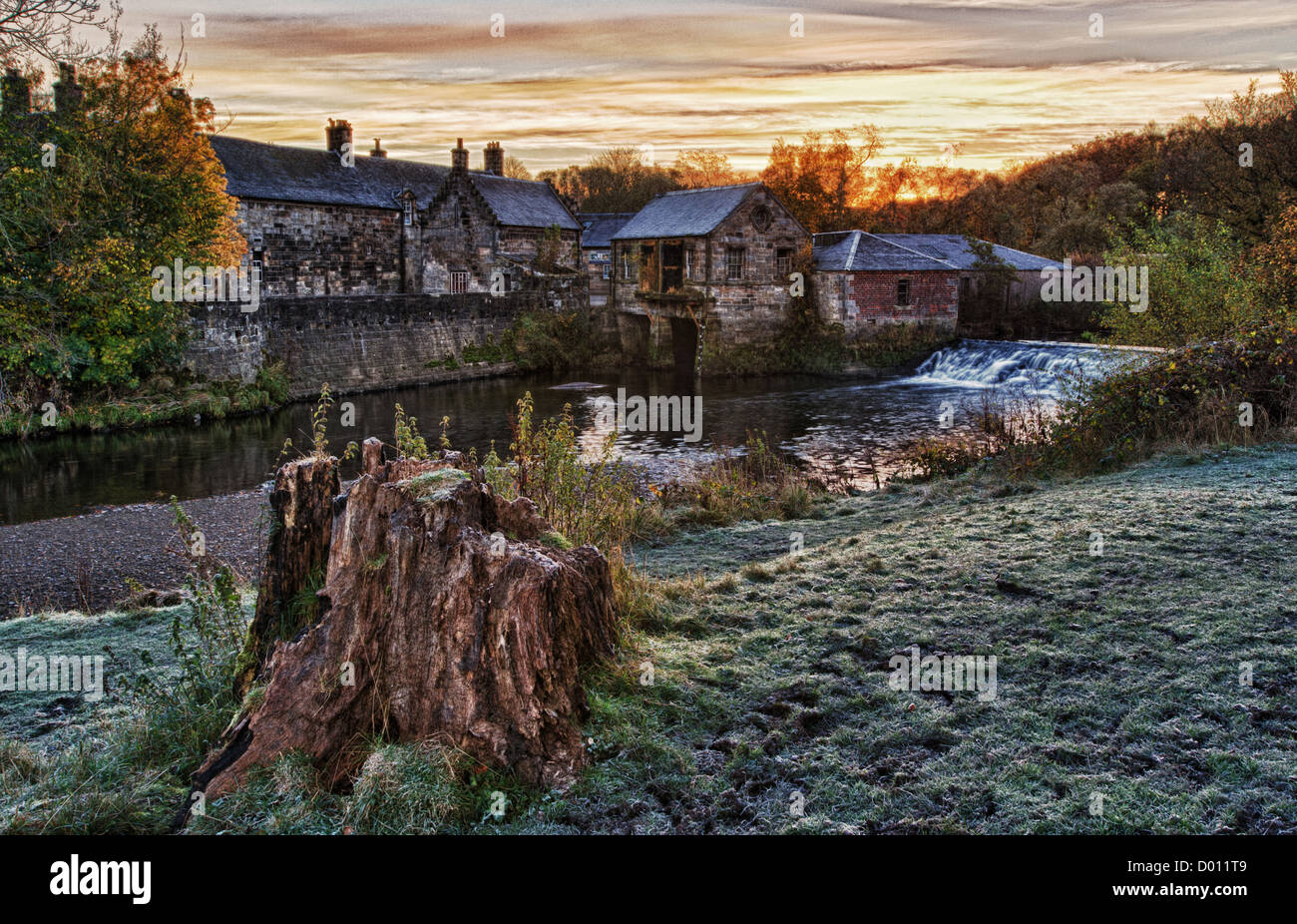 HDR image of sunrise over the White Cart river in Pollok Country Park, Glasgow, Scotland, UK. Stock Photo