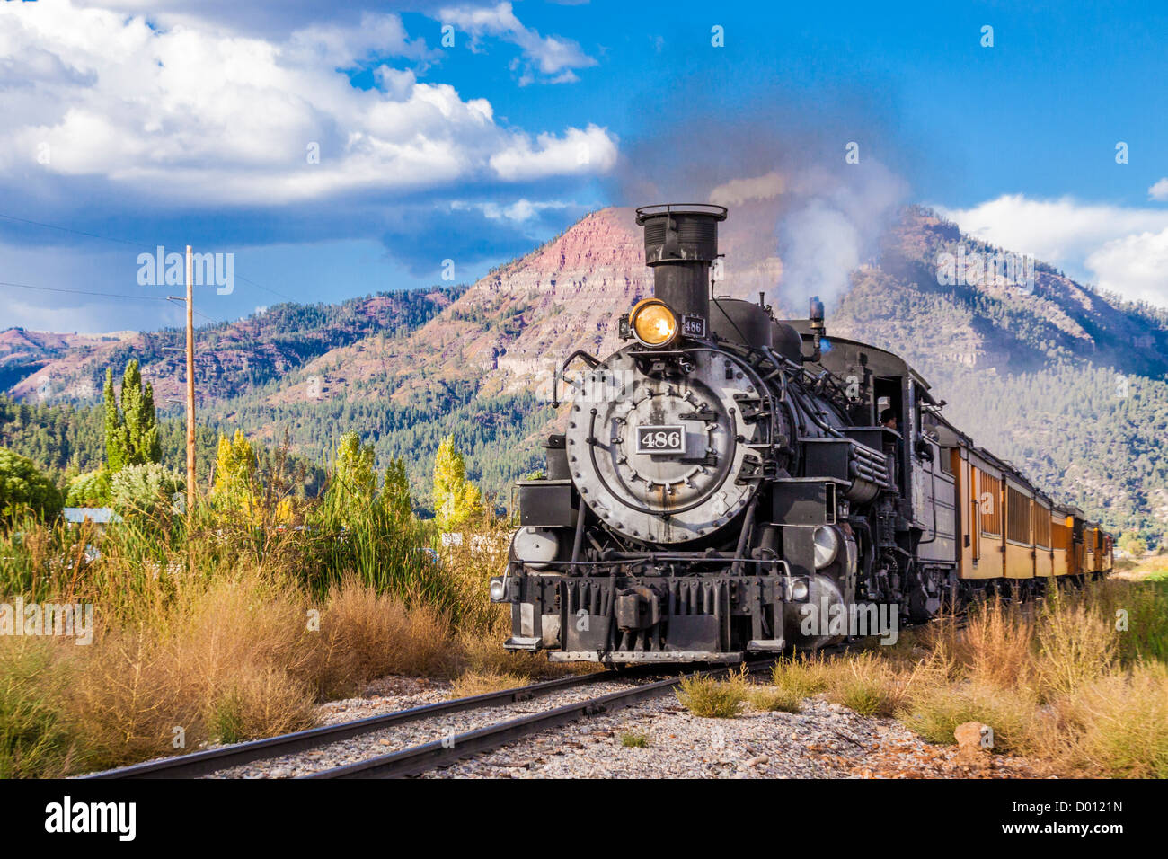 1925 Baldwin Steam Locomotive, 2-8-2 configuration, Mikado type, pulling historic classic railcars at Trimble Crossing Stock Photo
