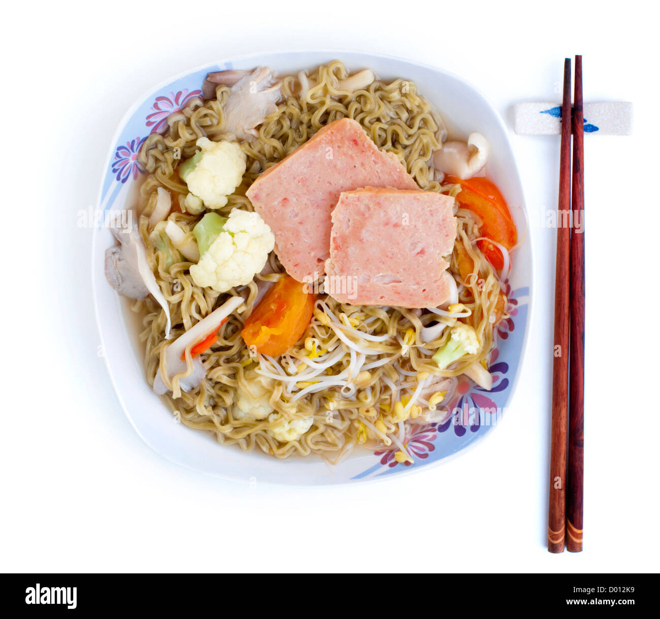 Asian ramen soup noodles with chopsticks. Stock Photo