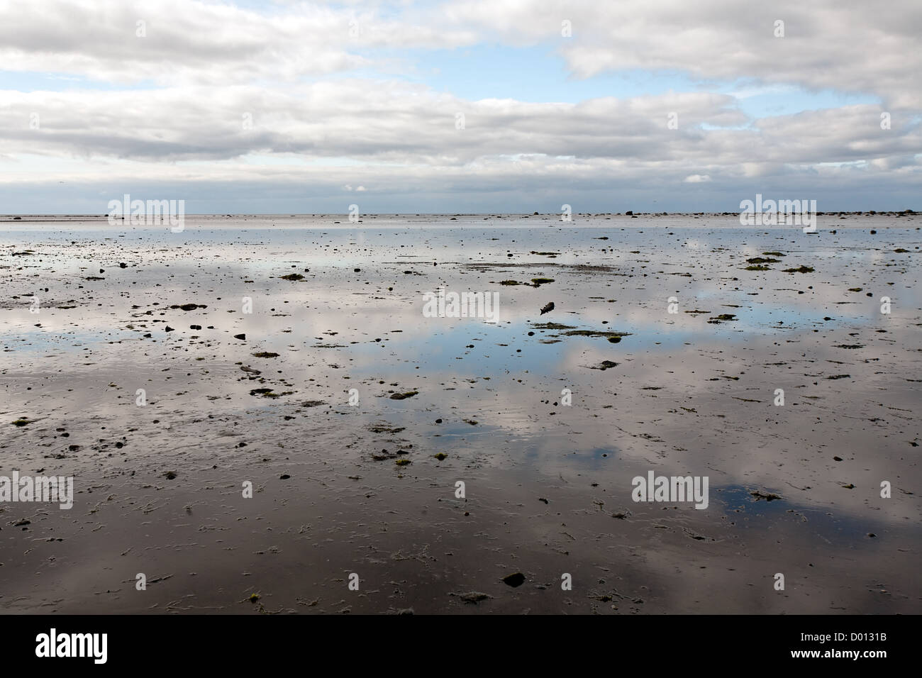 seascape with blue sky and white clouds reflection Stock Photo - Alamy