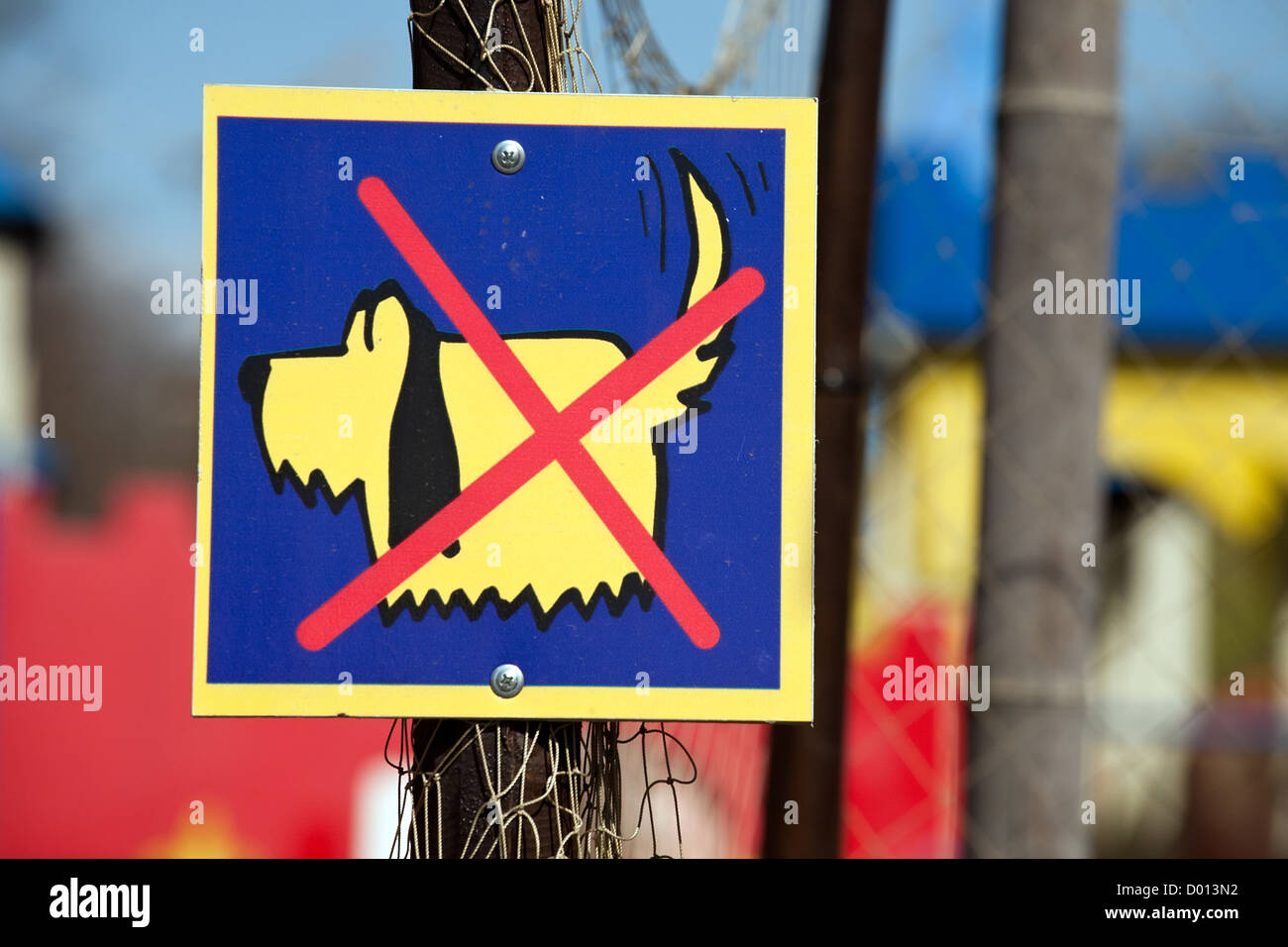 No Dogs Sign With Funny Little Dog And Red Cross Over It Stock Photo no-dogs-sign-with-funny-little-dog-and-red-cross-over-it-stock-photo