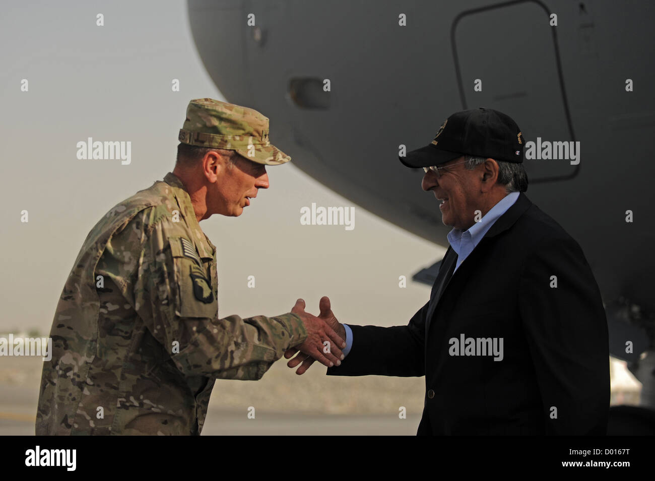 General David H. Petraeus, commander of the NATO International Security Assistance Force (ISAF) greets U.S. Secretary of Defense Stock Photo