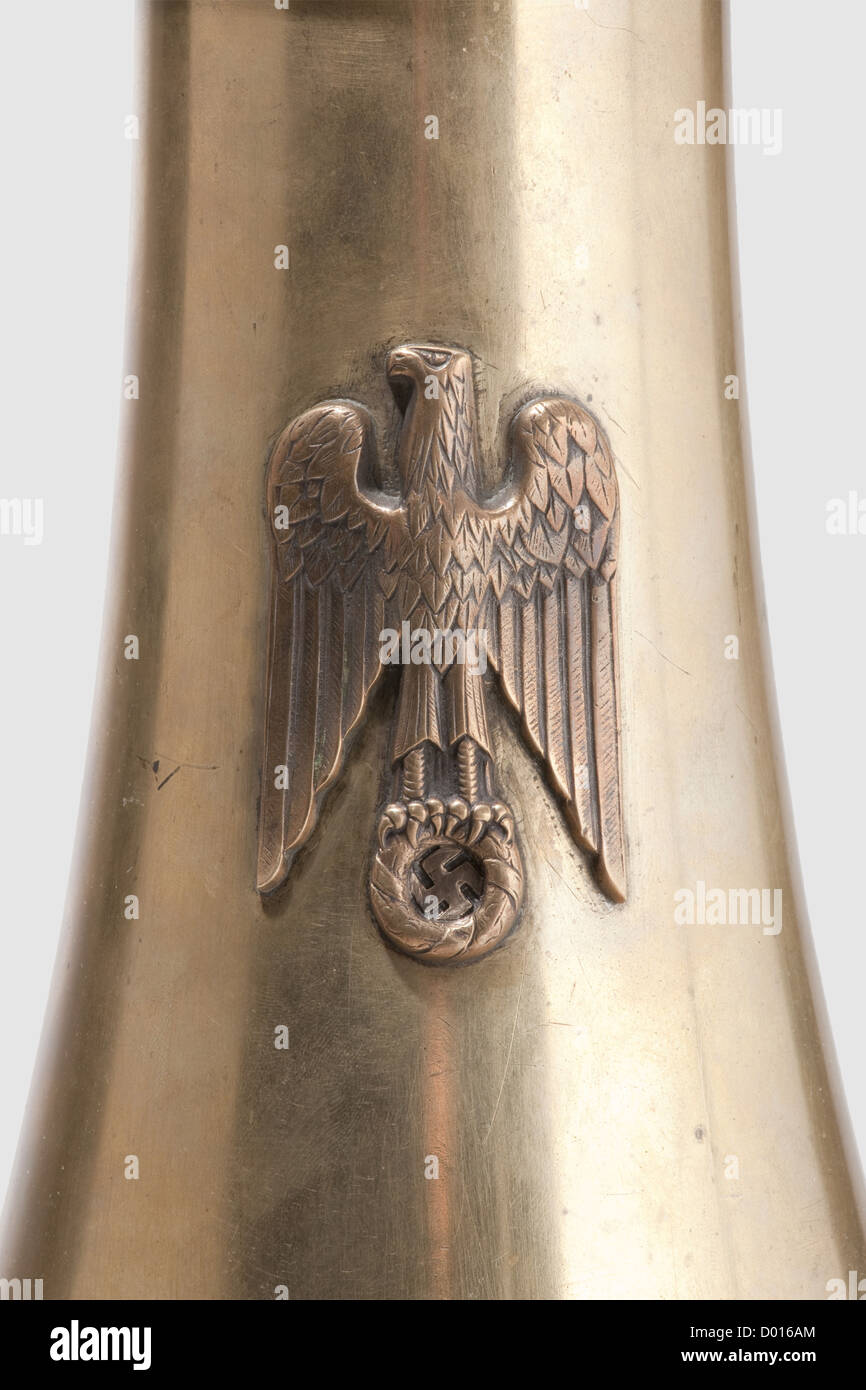 Hermann Göring - a brass candlestick,by Prof.Herbert Zeitner.Fashioned in the shape of a conical tower,the drip pan with continuous crenellations and a long pricket.Ornamented in areas by a hammer strike décor,the obverse with an applied national eagle.At the lower edge the struck mark 'Zeitner'.Height 30.3 cm.Although mainly known for his gold- and silversmith work,from 1924 Zeitner taught artistic design in nearly every metal at the United School for Applied Art in Berlin,and also experimented with other materials,historic,historical,1930s,1930,Additional-Rights-Clearences-Not Available Stock Photo