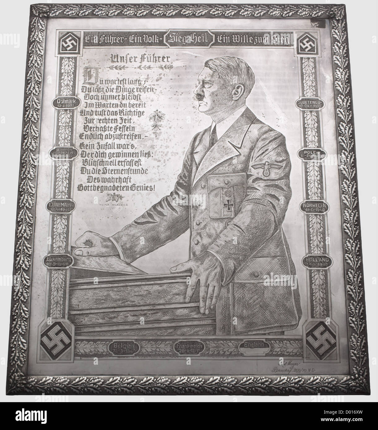 Adolf Hitler - a large, engraved homage panel from the Berndorf Metalware Factory 1940/41, Rectangular, hard silver-plated tablet with an oak leaf décor in relief on a raised edge. The centre with a masterfully engraved depiction of Adolf Hitler in party uniform, wearing an Iron Cross and Party Badge, at a speaker's lectern, with the poem 'Unser Führer' by Heinrich Anacker in the upper left corner. The depiction framed by an oak leaf border with the heading 'Ein Führer - Ein Volk - Ein Wille zum Sieg - Sieg Heil' with swastikas in the corners and continuous car, Stock Photo