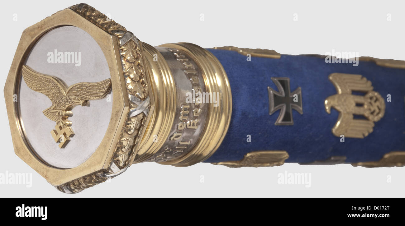 Field Marshal Albert Kesselring(1885 - 1960)- a marshal's baton,A reproduction of his marshal's baton,awarded on 19 July 1940.Silver,gold-plated in places.The shaft covered with blue velvet with superimposed national eagles and Iron Crosses.Gold-plated finial knobs with bound oak leaves,decorated with an enamelled Iron Cross and with the Luftwaffe eagle,respectively.Surrounded by the dedication in Gothic letters "Der Führer dem Generalfeldmarschall Kesselring"(The Führer to Field Marshal Kesselring)and "Zum Freiheitskampf des Großdeutschen Volkes 1,Additional-Rights-Clearences-Not Available Stock Photo