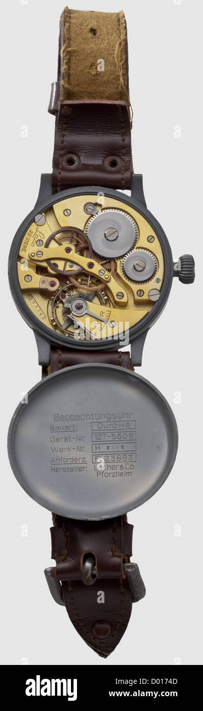 An observer's watch of the German Luftwaffe,Maker Lacher & Co,Pforzheim. Black clock face with radium light indices,blued hands filled with luminous material. Grey painted cast aluminium housing(small defects at the opening notch),laterally marked 'Fl 23883',matching numbered cover,exterior with 'H - 2342',interior stamped 'Beobachtungsuhr - Bauart DUROWE - Gerät-Nr. 127-560B - Werk-Nr. H 2342 - Anforderz. Fl. 23883 - Hersteller Lacher & Co Pforzheim'. Gilt works Nr. 'D 02342' calibre D5 Durowe(Deutsche Uhren-Rohwerke)with 22 jewels,Guillaume balance,Additional-Rights-Clearences-Not Available Stock Photo