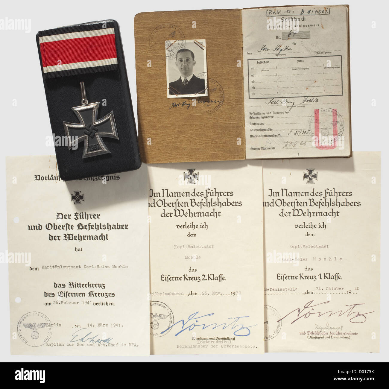 Korvettenkapitän(Commander)Karl-Heinz Moehle - Knight's Cross of the Iron Cross of 1939 and documents,The Knight's Cross by Klein & Quenzer,Hanau.Blackened iron core in a silver frame punched "800",the suspension ring also punched "800".Weight 30 g.Together with a section of ribbon 39 cm in length,in an award presentation case.Included is the preliminary possession document dated 26 February 1941 as a Kapitänleutnant(Lieutenant Commander)with ink signature of Kapitän zur See Ehrhardt.Also,the award documents for the Iron Cross 1st and 2nd Class da,Additional-Rights-Clearences-Not Available Stock Photo