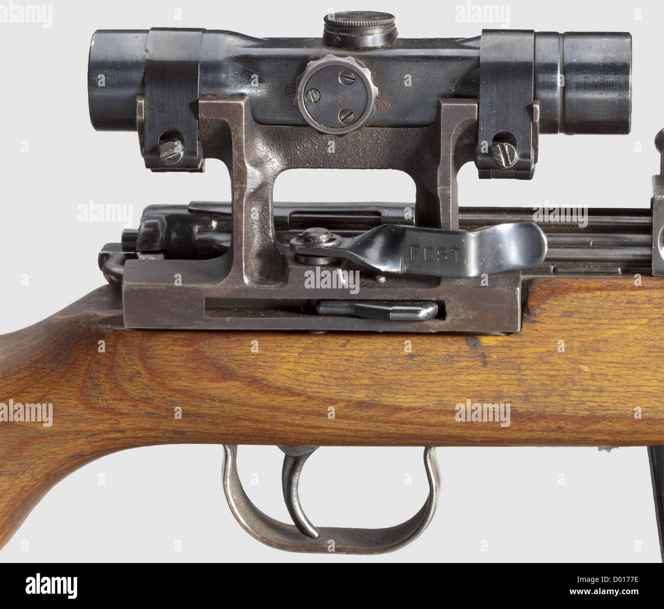 A self-loading rifle G 43,code 'ac 44' with scope ZF 4,cal.8 x 57,no.2159n.Matching numbers.Bright bore.Produced in 1944 at Walther's in Zella-Mehlis.Various acceptance marks eagle/'359'.Ten shots.Dust cover.Large,correct hooded sight.Original finish in a light patina,few wear marks.Matching-numbered laminated stock with cleaning rod.Magazine coded 'gcb'.Mounted: original,re-finished scope ZF 4,marked 'Gw ZF 4 / 57477 / ddx',beside it 'L' for Luftwaffe.Reticule 1.Without protection cap for windage.Technically and optically in good order.,Additional-Rights-Clearences-Not Available Stock Photo