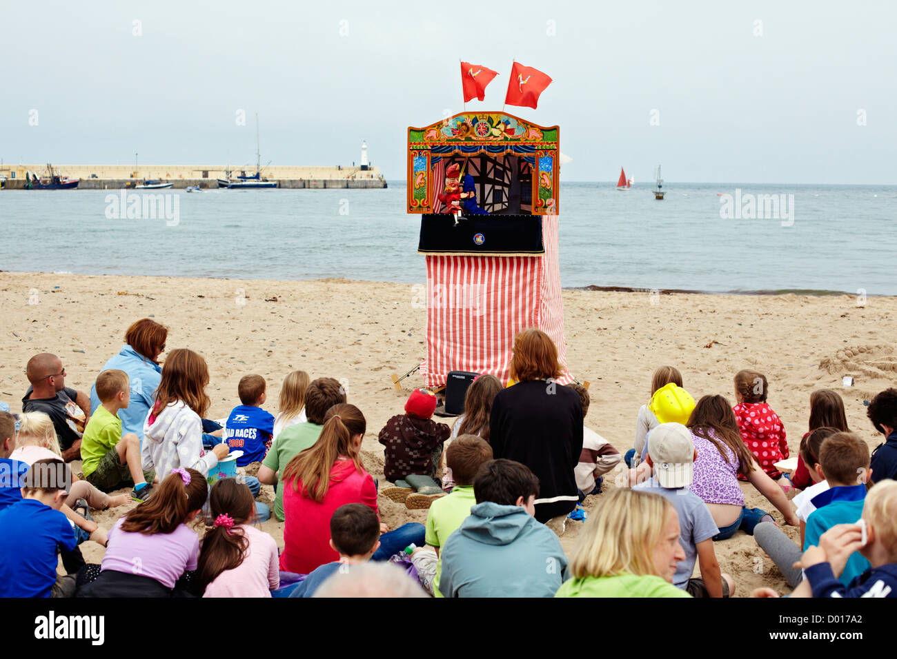 Punch and Judy show on the beach at Peel Isle of Man Stock Photo