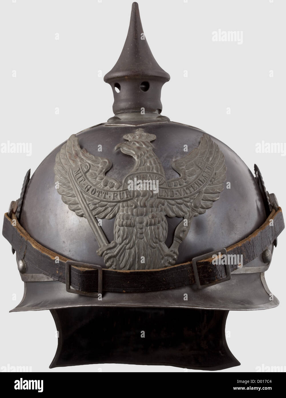 A model 1915 helmet for enlisted men,Blued steel skull with bright metal trim and rivets. Field grey spike on a bayonet mount. Field grey dragoon eagle. Leather chinstraps on '91' buttons. Enlisted men's cockades. Leather lining. The maker's inscription 'Weissenburger & Cie Cannstatt' is inside at the top,historic,historical,1910s,20th century,Prussian,Prussia,German,Germany,militaria,military,object,objects,stills,clipping,clippings,cut out,cut-out,cut-outs,helmet,helmets,headpiece,headpieces,utensil,piece of equipment,utensils,prote,Additional-Rights-Clearences-Not Available Stock Photo
