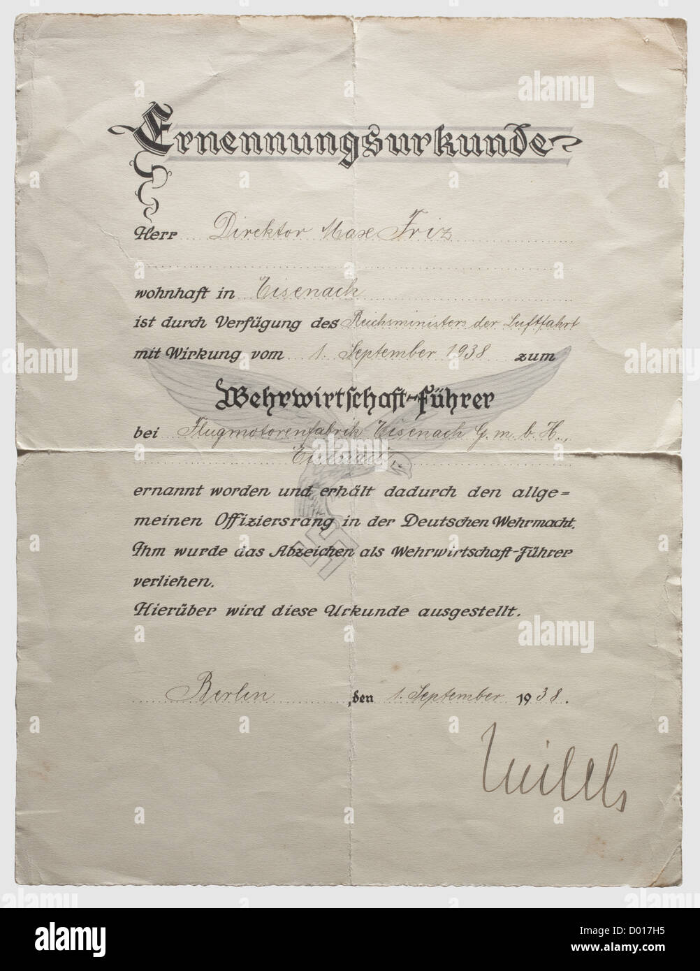 A appointment document to tenured members of the German Academy for Aeronautical Research,to Director Friz dated 31 March 1942.Double-page on handmade paper with Hermann Göring ink signature and blind-stamped seal.Folded.Appointment document for defense economy leader in Officer's rank of the German Wehrmacht to Director Friz of aircraft engine factory Eisenach GmbH,simultaneous with the award of the defense economy leader's decoration,dated 1 September 1938 with Milch signature in ink.Folded.A rare award documents group,historic,historical,1930s,19,Additional-Rights-Clearences-Not Available Stock Photo
