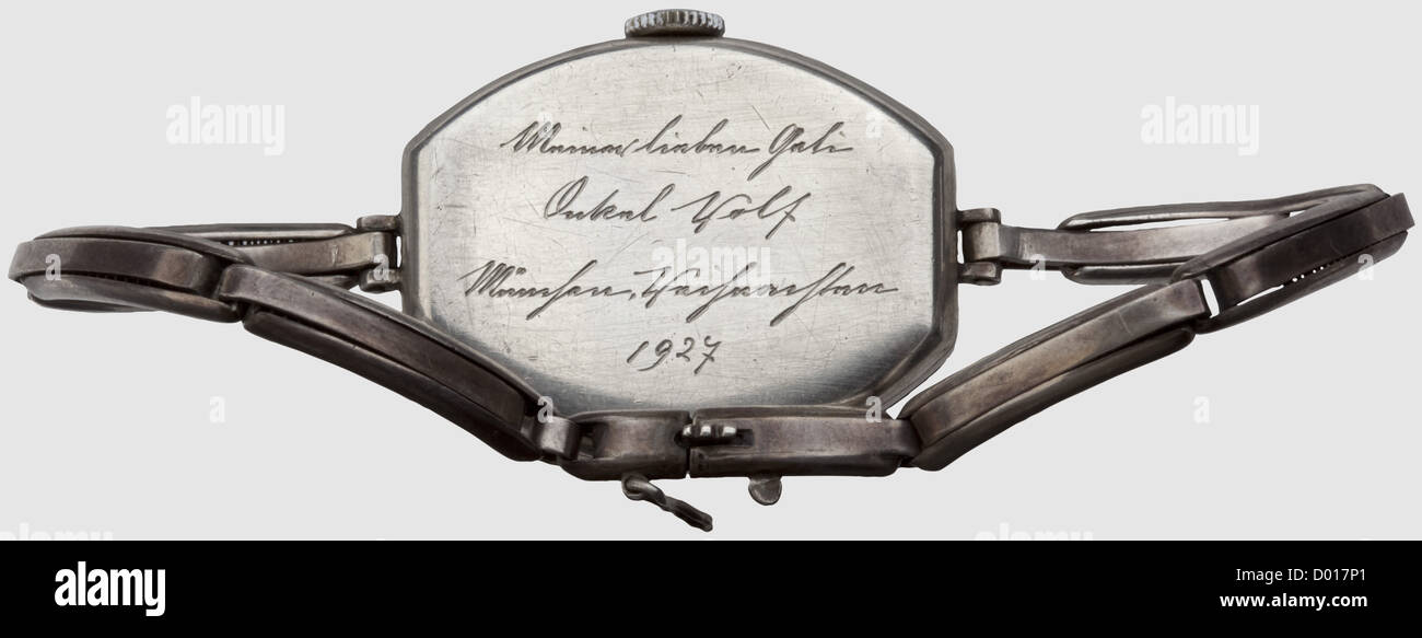 Adolf Hitler - a ladies wristwatch presented to Geli Rabaul,Christmas 1927,Silvered housing and wrist band. Silver clock face with Arabic numerals and blued lancet hands. No maker. The back cover engraved with the inscription: 'Meiner lieben Geli - Onkel Wolf - München,Weihnachten,1927'('To my dear G historic,historical,1920s,20th century,NS,National Socialism,Nazism,Third Reich,German Reich,Germany,German,National Socialist,Nazi,Nazi period,fascism,object,objects,stills,clipping,clippings,cut out,cut-out,cut-outs,clock,clocks,watc,Additional-Rights-Clearences-Not Available Stock Photo