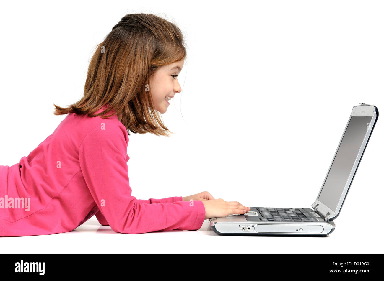 Young girl posing with laptop isolated in white Stock Photo - Alamy