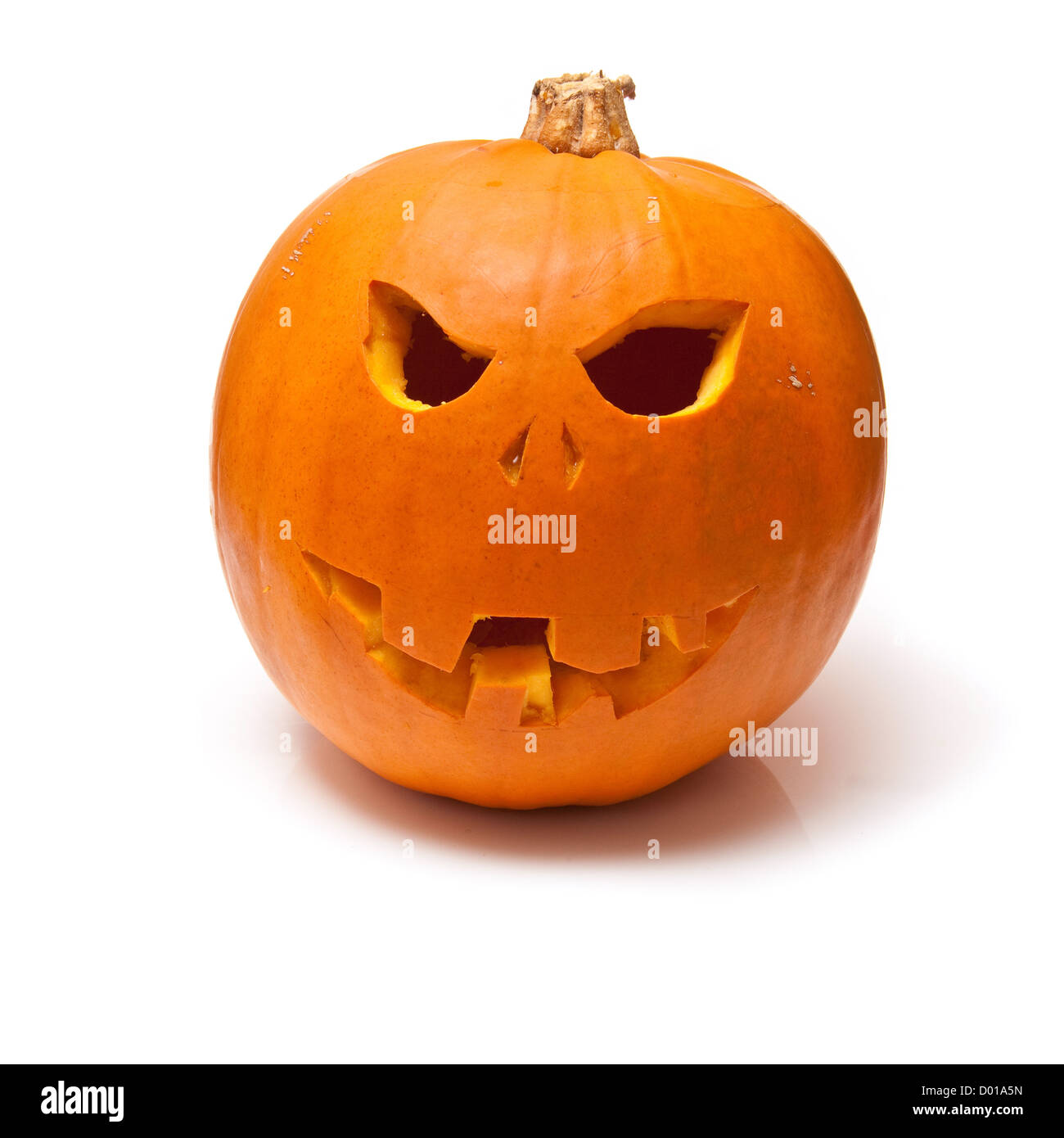 Orange carved Halloween pumpkin isolated on a white studio background ...