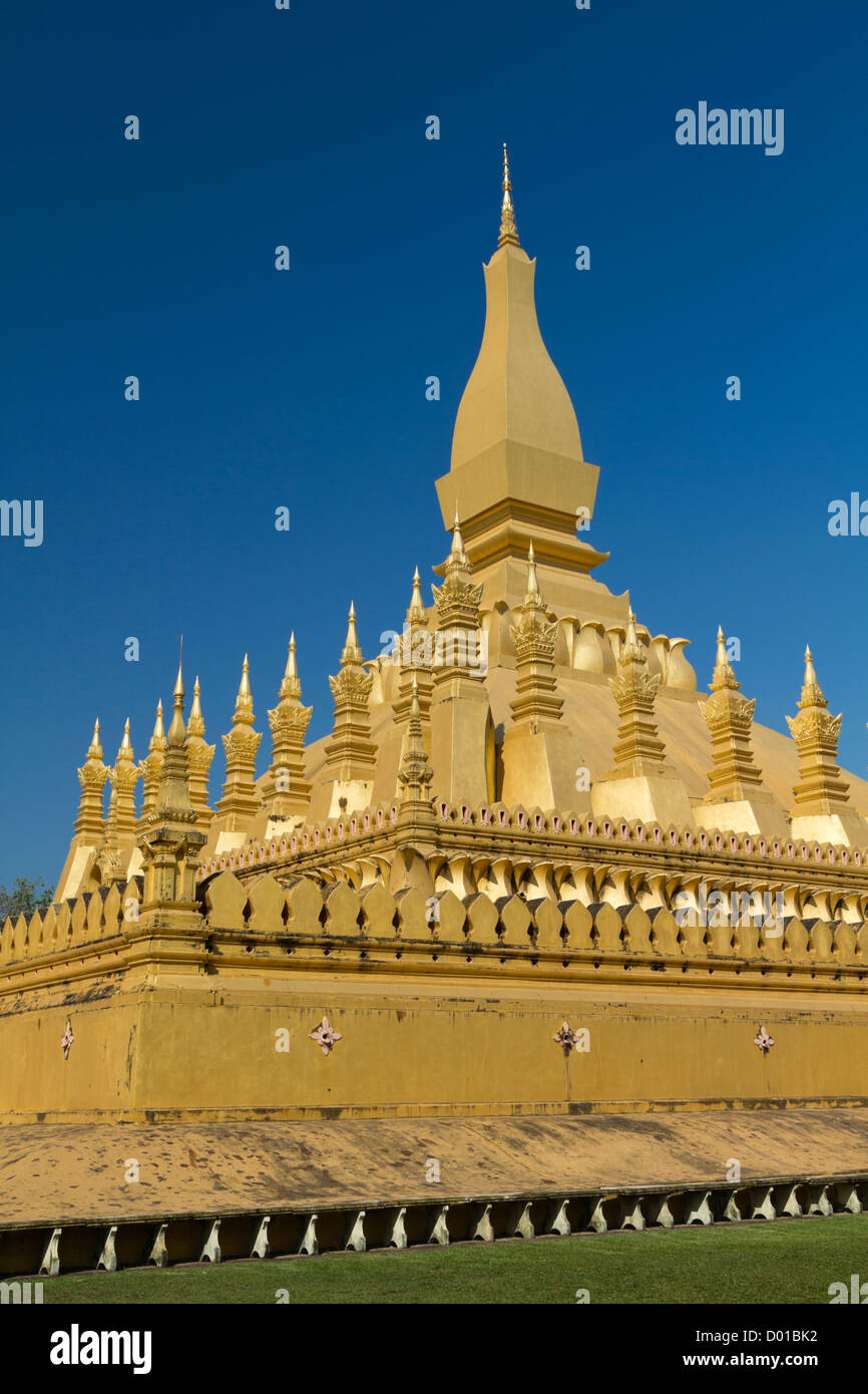 Pha That Luang is a large, gold-covered Buddhist stupa in the centre of Vientiane, Laos. Stock Photo