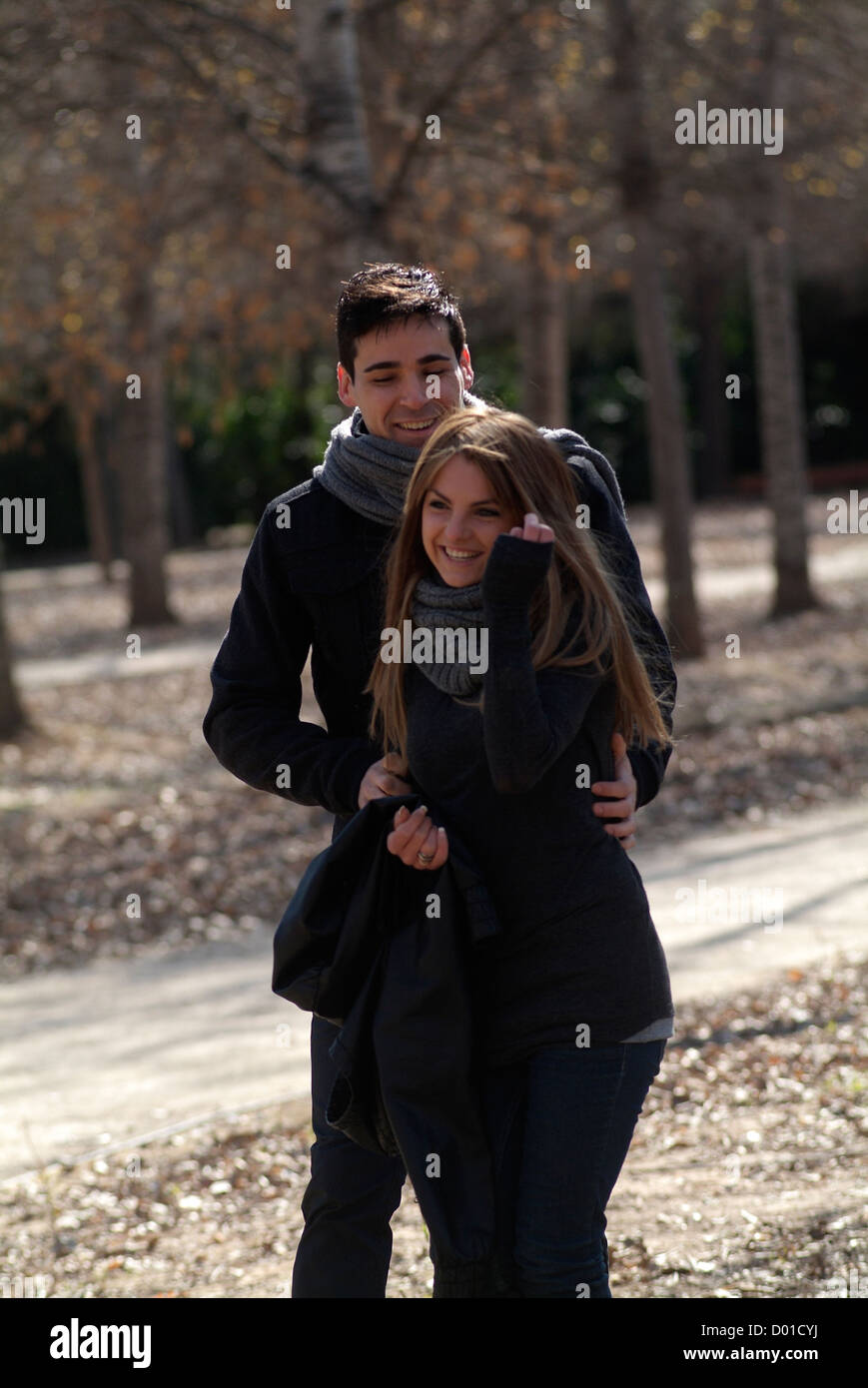 Loving couple walking in the park Stock Photo - Alamy