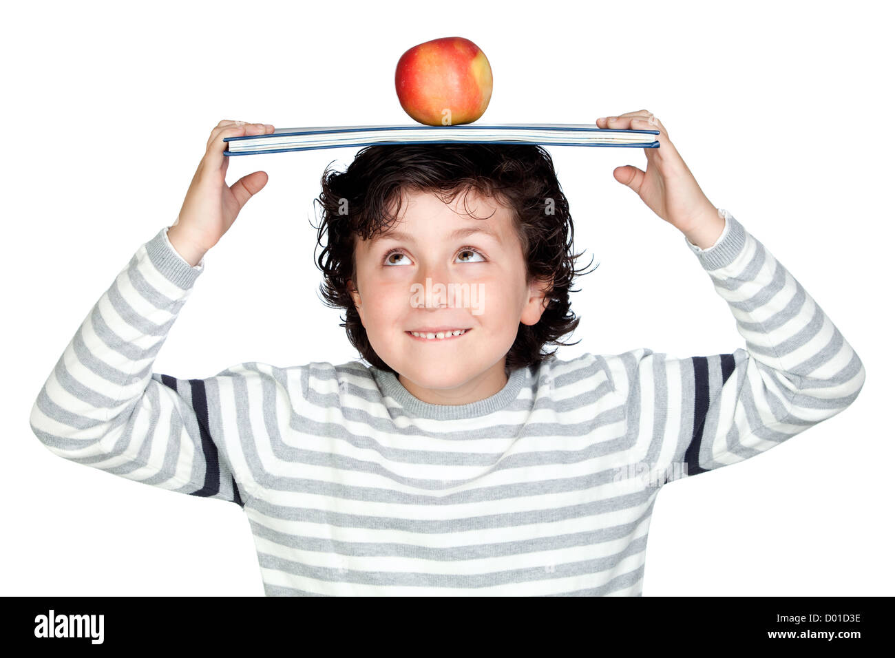 Student child with a book over his head isolated over white background ...