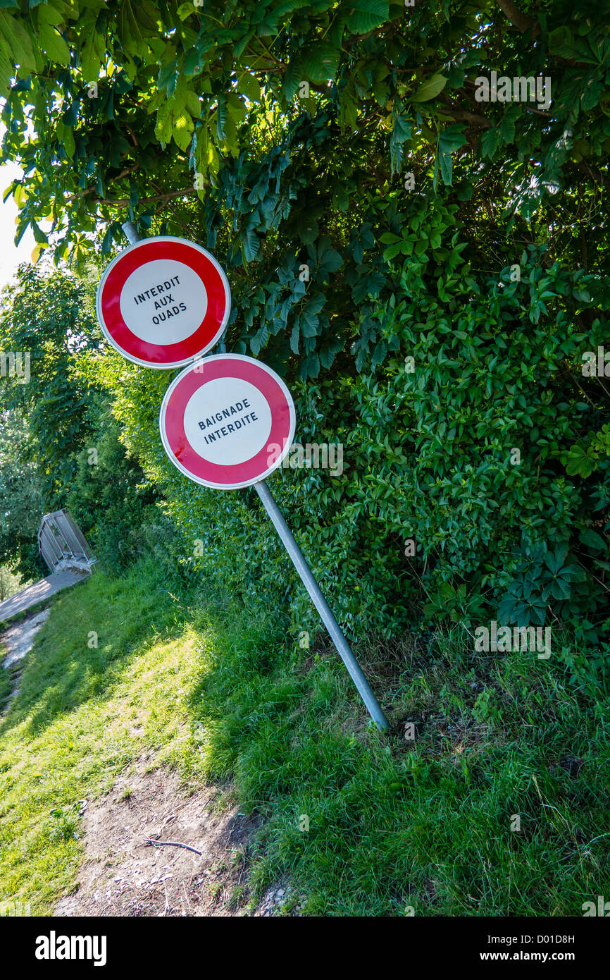 No Bathing and No Quadbike sins on the canal bank at Houlle, Pas-de-Calais, France. Stock Photo