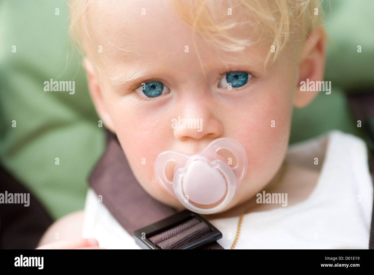 One year baby with deep blue eyes portrait closeup Stock Photo - Alamy