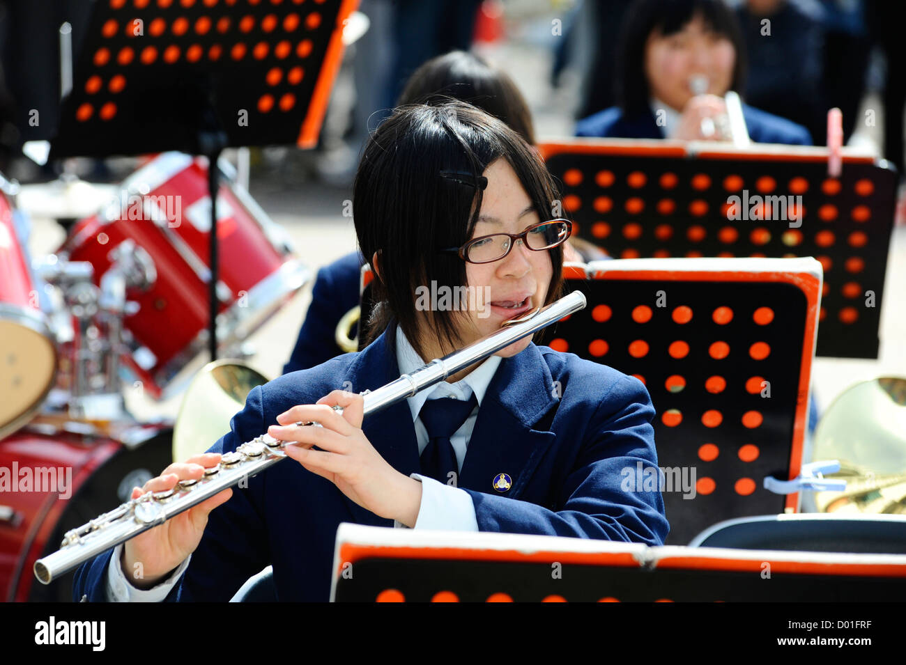 Japanese schoolgirl playing a flute at Hyuga, Japan Stock Photo Alamy