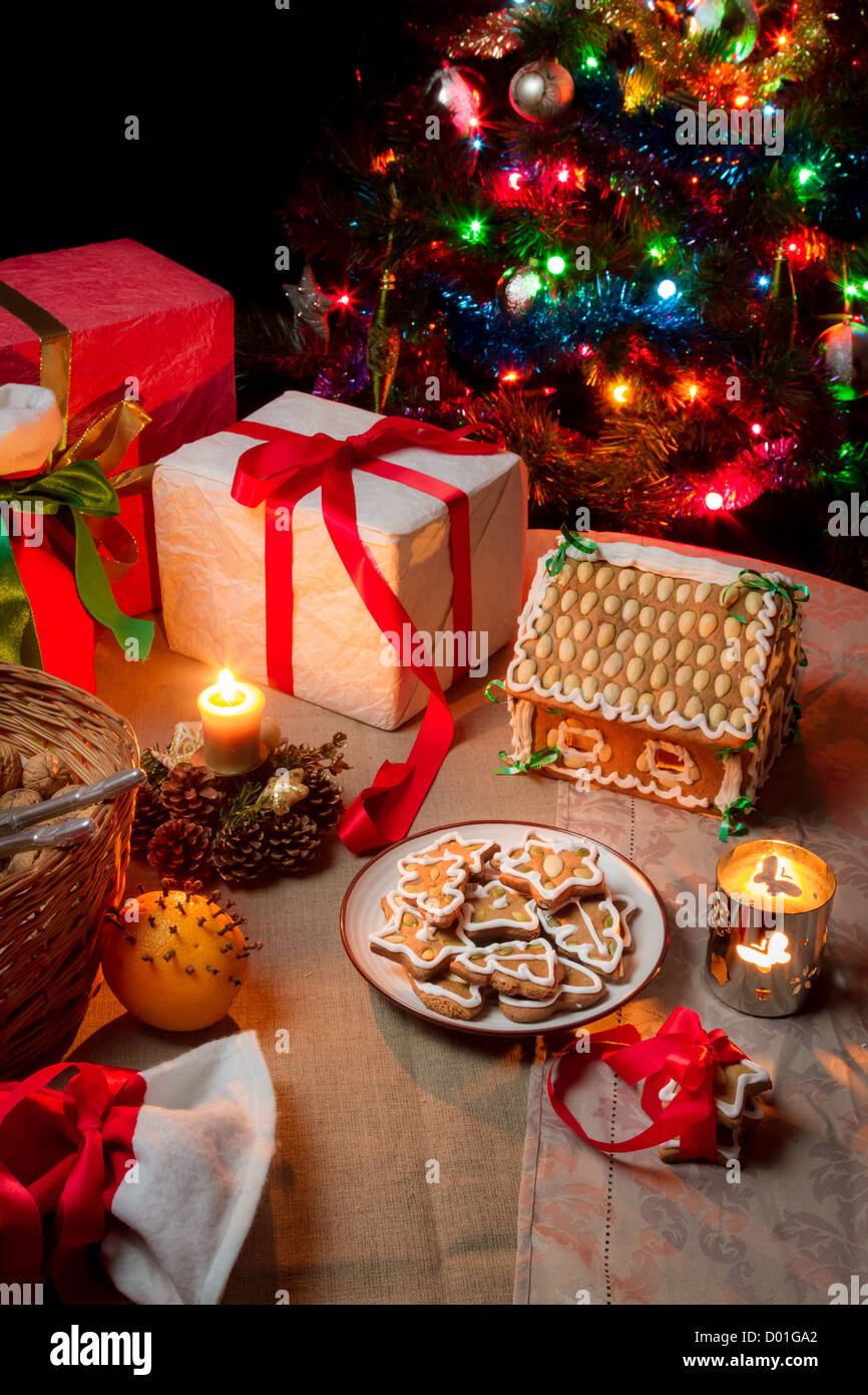 Warm light from the Christmas tree and candles on Christmas Eve Stock Photo Alamy