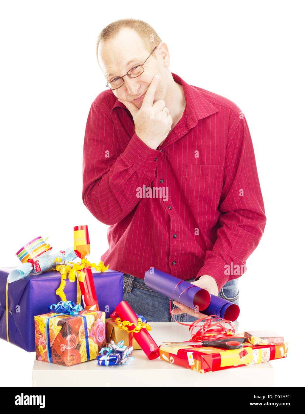 Person packaging some colorful gifts Stock Photo