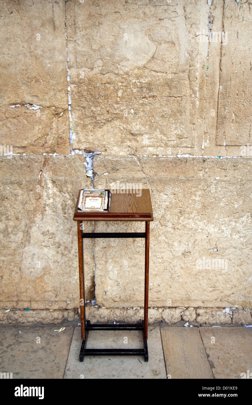 Torah on a cabinet and Jews praying at the Wailing Wall, Jerusalem. Israel Stock Photo