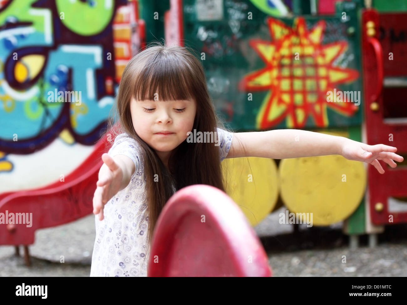 Portrait of beautiful young girl on the playground Stock Photo - Alamy