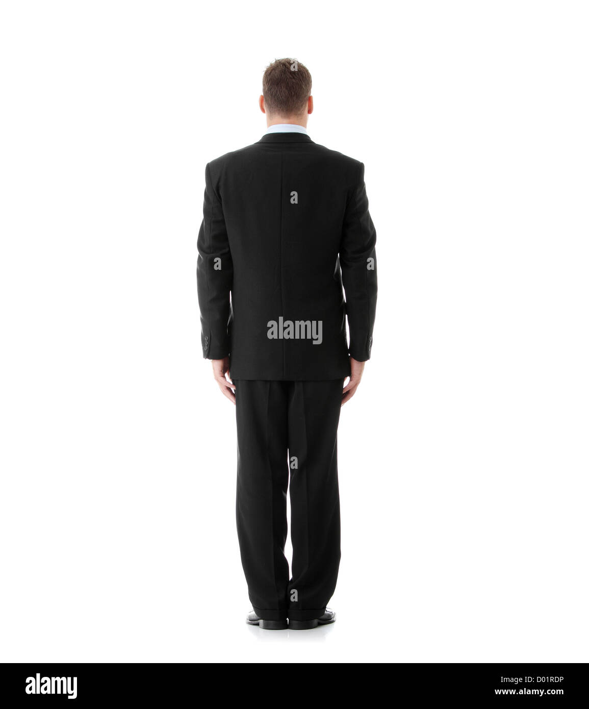 Full lenght portrait of businessman standing back, isolated Stock Photo