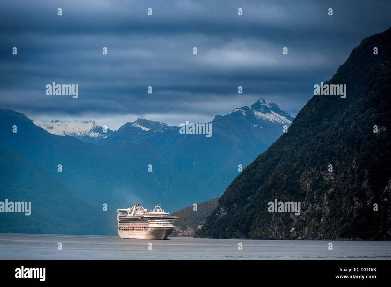 Cruise liner on Doubtful Sound, Fiordland National Park. New Zealand South Island Stock Photo