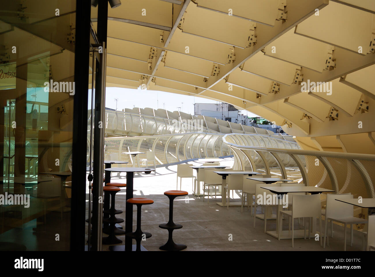 Restaurant tables and chairs on the viewing deck of the Metropol Parasol in  Seville, Andalusia, Spain Stock Photo - Alamy