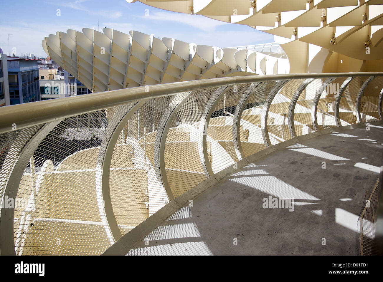 Shadows and railings on the viewing deck of the Metropol Parasol in Seville, Andalusia, Spain Stock Photo