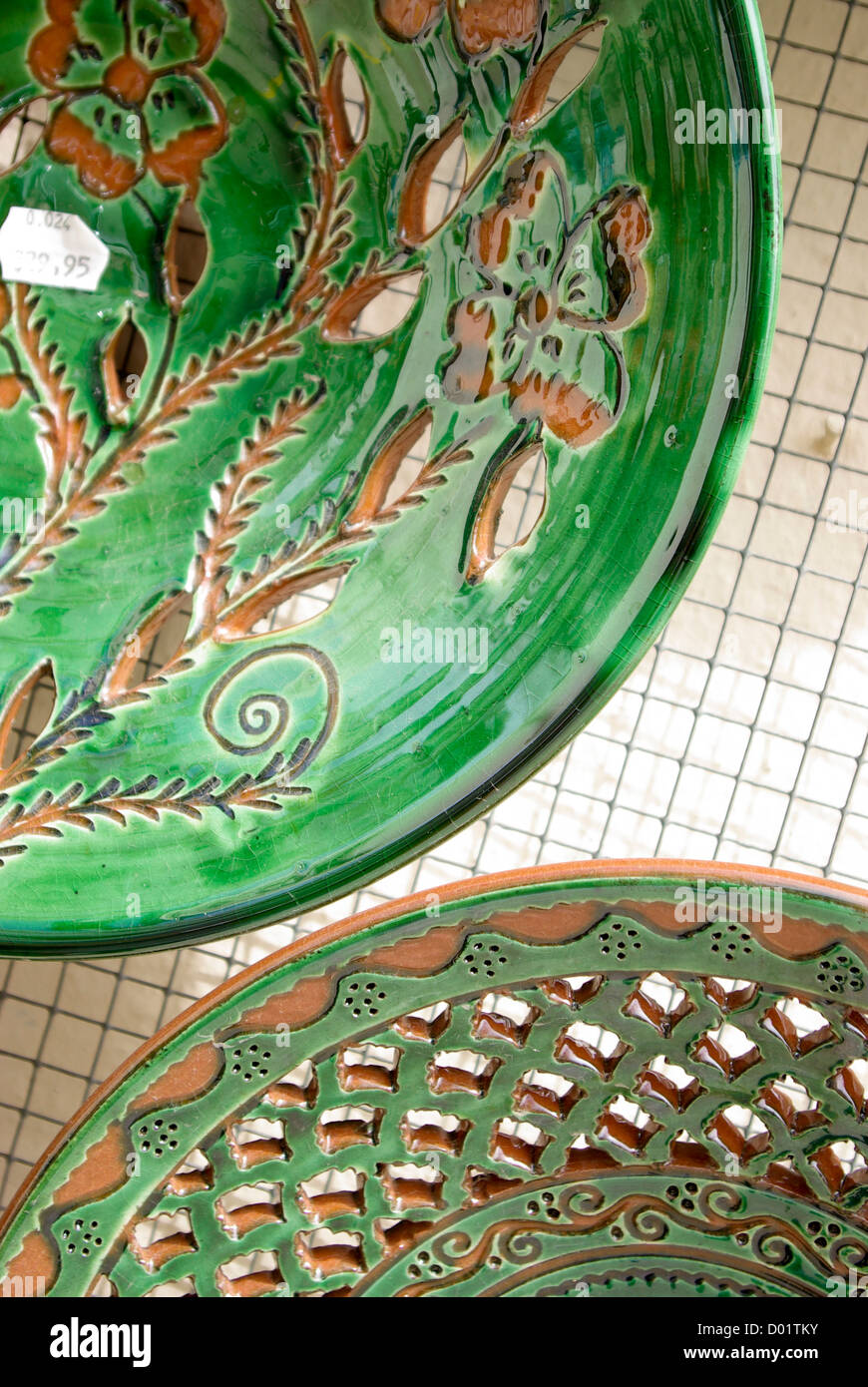 Close-up of plates for sale in a tourist shop in Ronda, Andalusia, Spain with price tag. Stock Photo