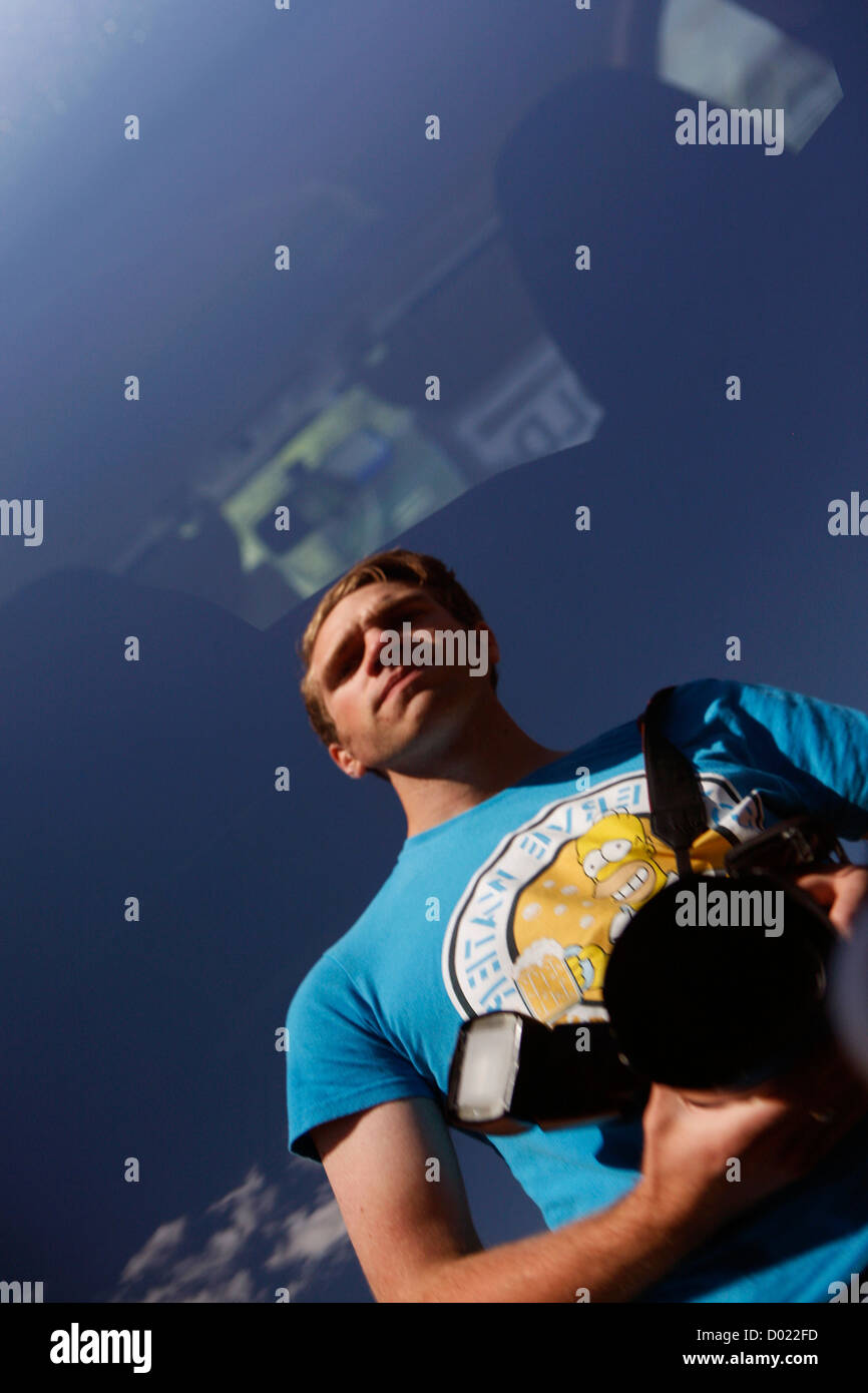 The reflection of a photographer in a car window Stock Photo Alamy