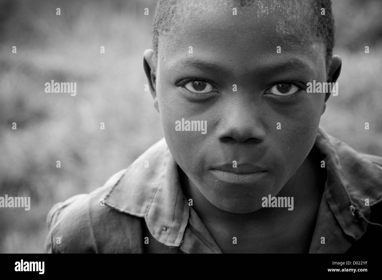 Black and white portrait of a young African boy Stock Photo - Alamy