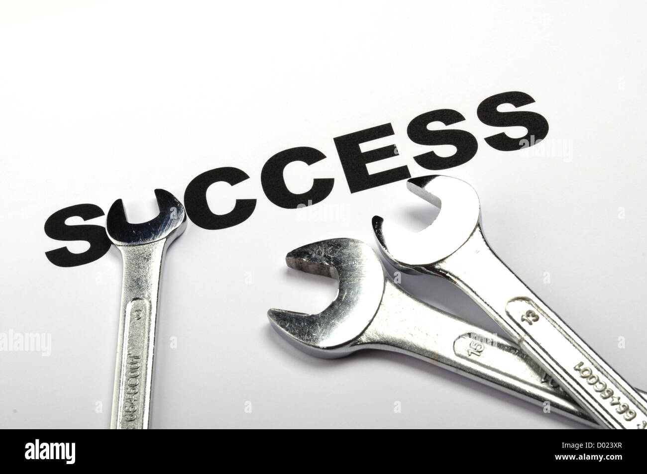 success concept with word and tool showing business growth Stock Photo