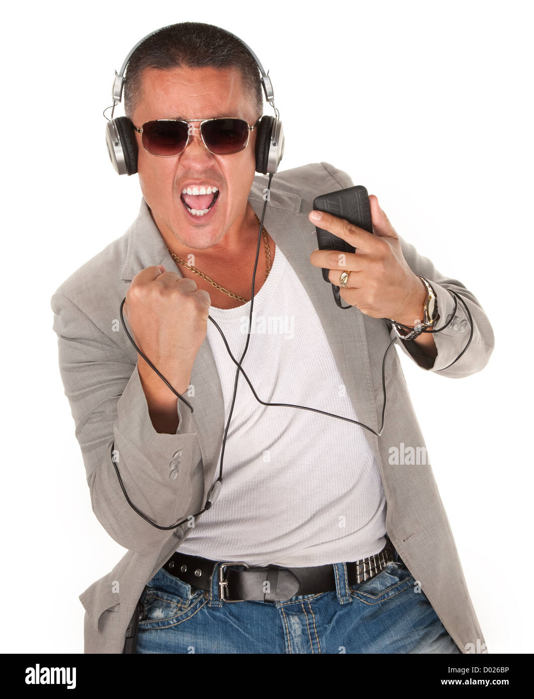 Native American Man dances to music from his MP3 player Stock Photo